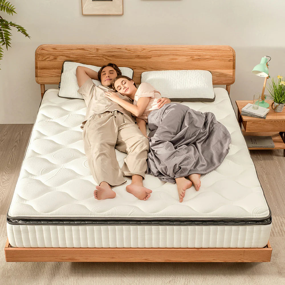 couple sleeps on a CHOICE recommended valmori spring mattress