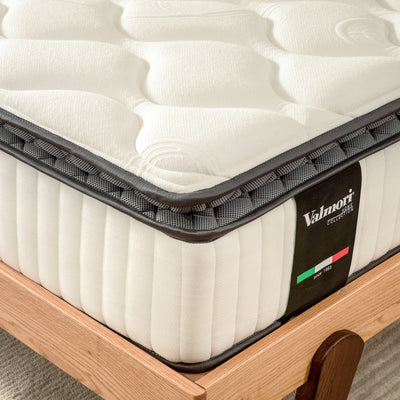 A close-up view of the edge of the Valmori Firm Spring Mattress