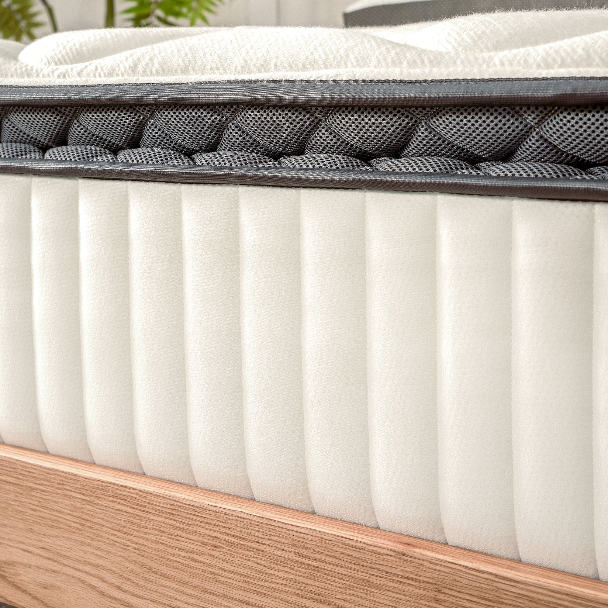 A close-up view of the side of the Valmori Spring Mattress - Firm