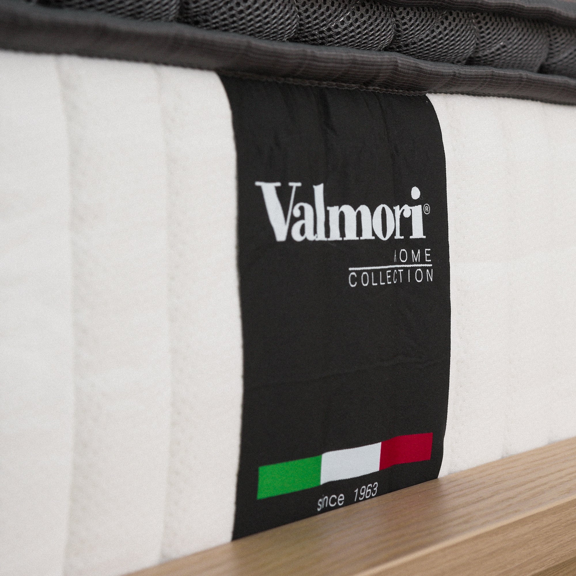 Logo of Valmori Home Collection on a Spring Mattress - Firm